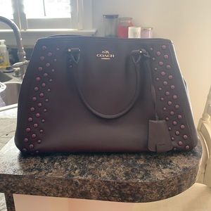 Coach purse with metal studs